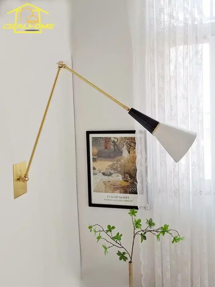 Applique murale LED en laiton avec bras pivotant réglable style contemporain noir or pour cuisine et salles à manger élégante à offrir pour femmes occasions spéciales