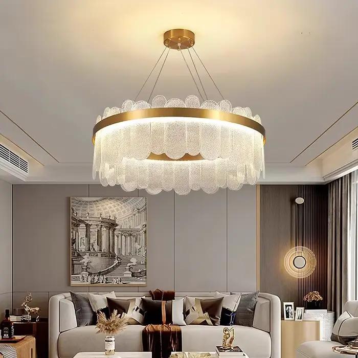 Lustre doré moderne led villa luxe cristal verre lumière éclairage intérieur or métal hôtel hall atmosphérique salle à manger lumière-decoration-intérieure-sophistication-luxe