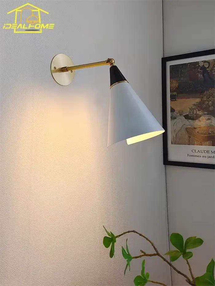Applique murale LED en laiton avec bras pivotant réglable style contemporain noir or pour cuisine et salles à manger élégante à offrir pour femmes occasions spéciales
