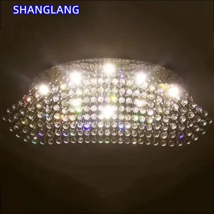 Lustre en cristal moderne avec acier inoxydable brossé pour éclairage contemporain et installation encastrée pour salon et chambre d'hôtel