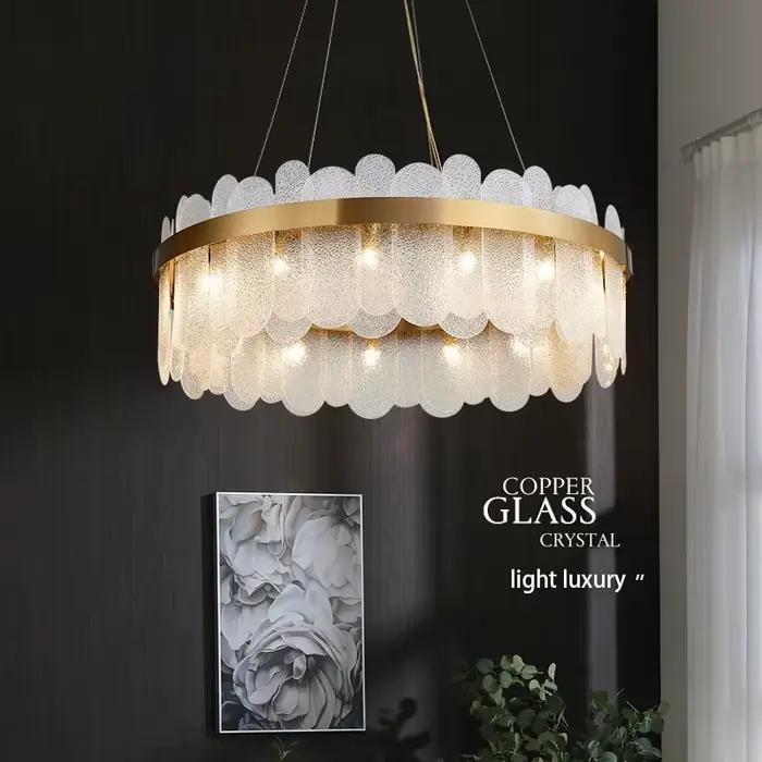 Lustre doré moderne led villa luxe cristal verre lumière éclairage intérieur or métal hôtel hall atmosphérique salle à manger lumière-decoration-intérieure-sophistication-luxe
